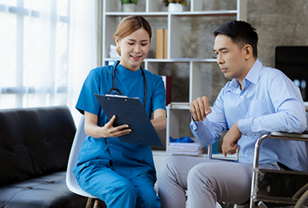 A medical provider coordinates with her male patient for a smooth medical tourism consultation.